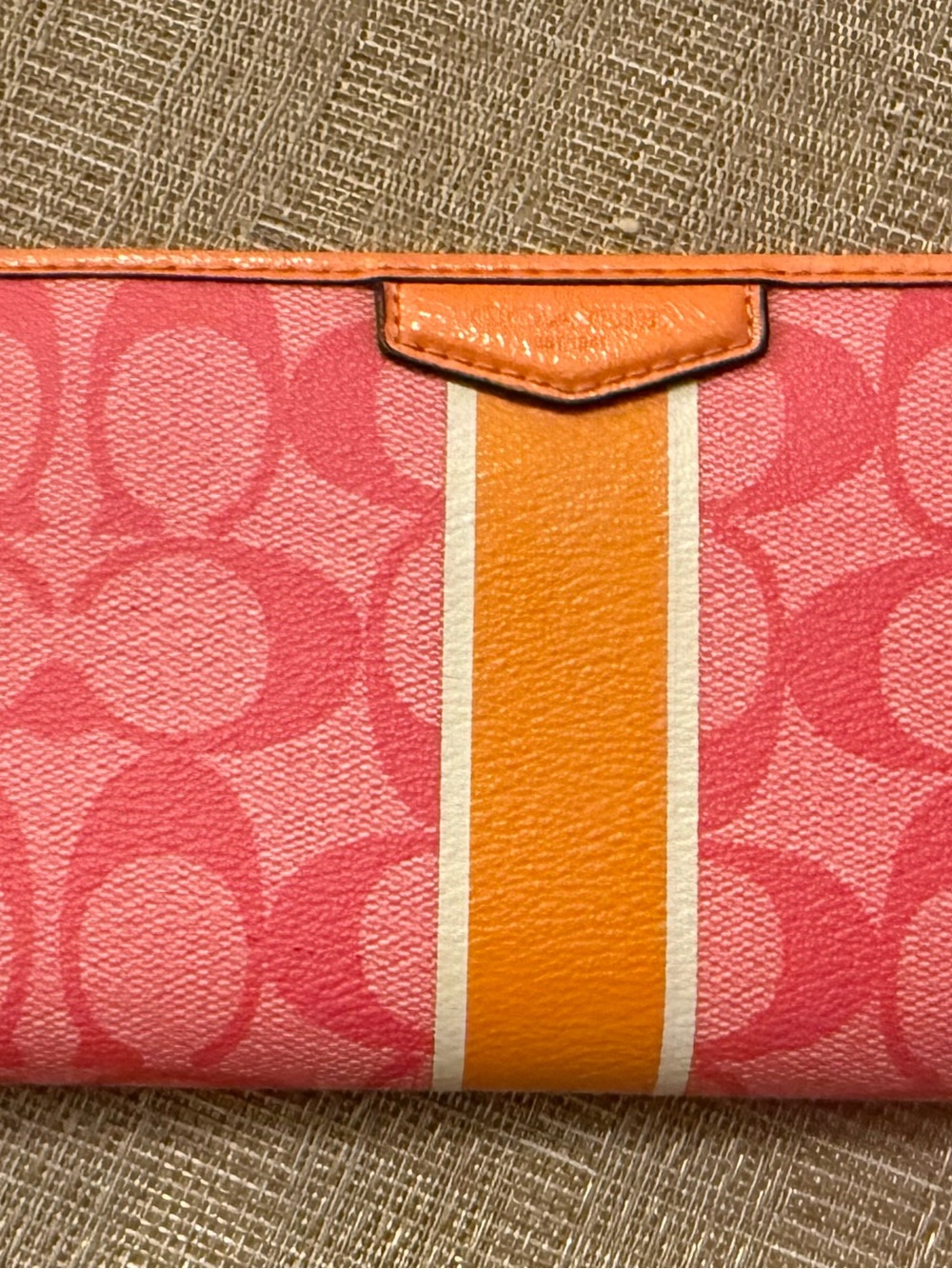 Pink and orange Coach zip around wallet from the early 2000’s